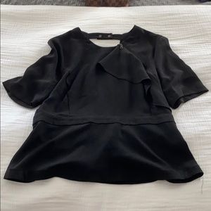 BCBG peplum style, open back blouse.